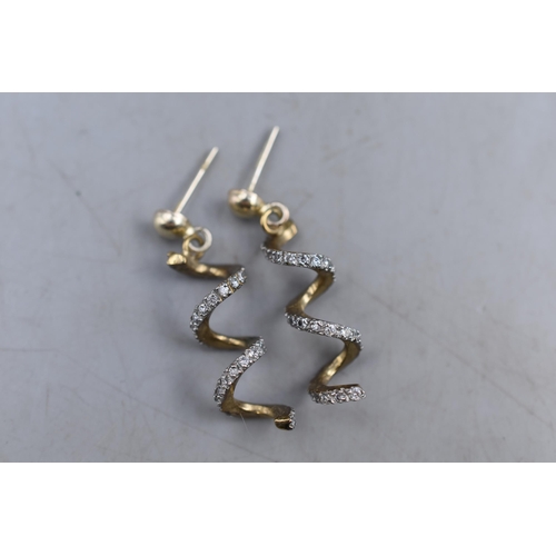18 - Pair of Gold 375 and Diamante Spiral Earrings