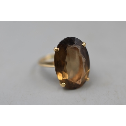 23 - A 14ct Gold Smokey Quartz Stoned Ring, Size P/Q (6.95 Grams)