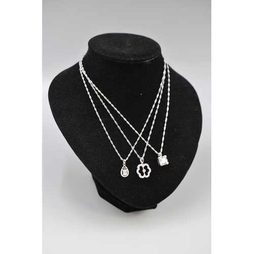 45 - Three Silver 925 Pendant Necklaces includes Flower Design and Two Clear Stone Designs