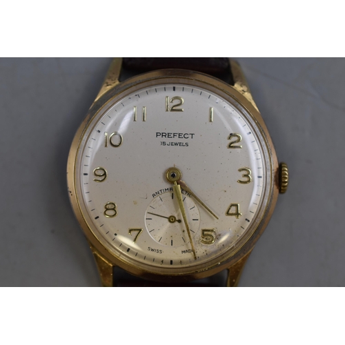 73 - A Prefect 15 Jewels Gents Mechanical Watch With Leather Strap, Working