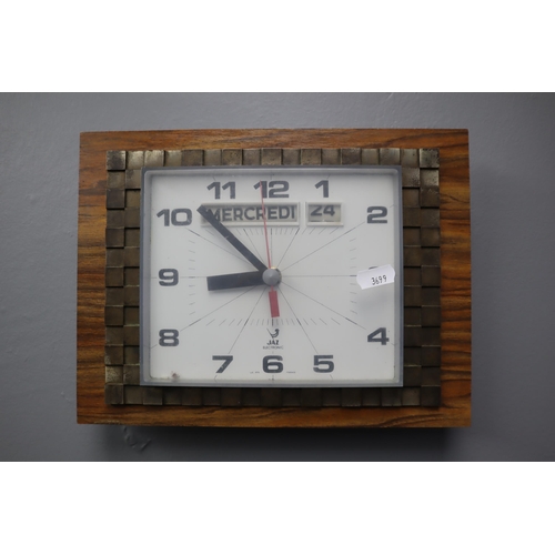 310 - A Retro French ‘Jaz Electronic’ Wall Clock, Approx 8.5”x11.5”. AF