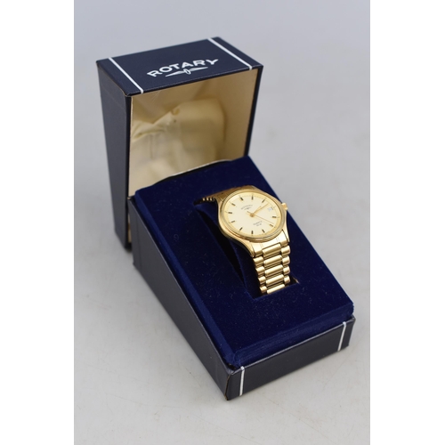 86 - A Gold Tone Rotary Quartz Day/Time Watch, In Presentation Box With Paperwork. Working