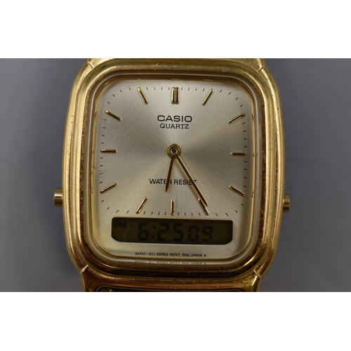 88 - A Casio Gold Tone AQ-307 Analogue Digital Display Quartz Watch, Working