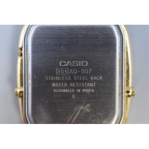 88 - A Casio Gold Tone AQ-307 Analogue Digital Display Quartz Watch, Working