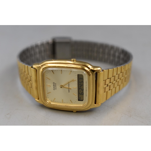 88 - A Casio Gold Tone AQ-307 Analogue Digital Display Quartz Watch, Working