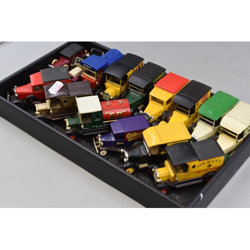 114 - Tray of Di-Cast vehicles to include Matchbox and Lledo and others with logo's of Cadbury's, BP, Mobi... 