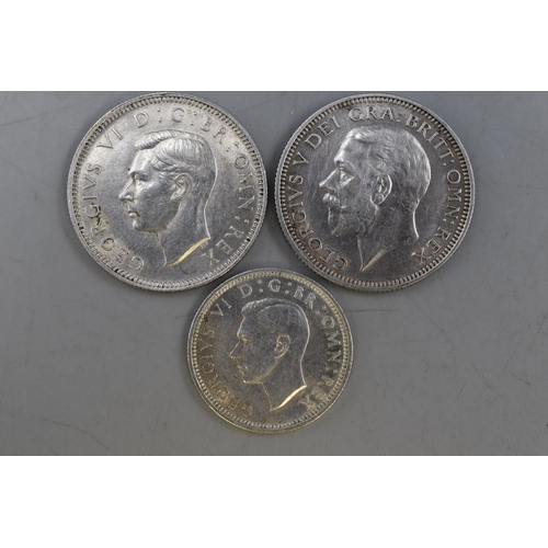 125 - Three Coins to include 1929 Shilling, 1942 Shilling and a 1944 Sixpence