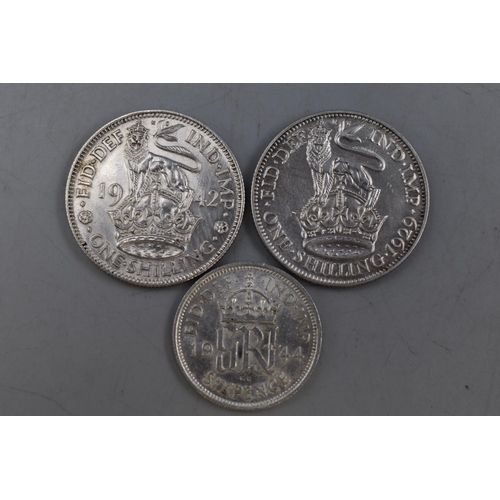 125 - Three Coins to include 1929 Shilling, 1942 Shilling and a 1944 Sixpence