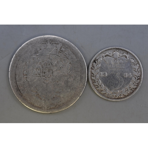 128 - Two Coins to include 1816 George III Silver Shilling & an 1884 Victoria Silver Three Pence Coin