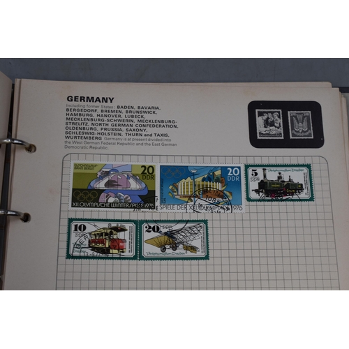 430 - A Stanley Gibbons Swiftsure Stamp Album With a Selection of Worldwide Stamps