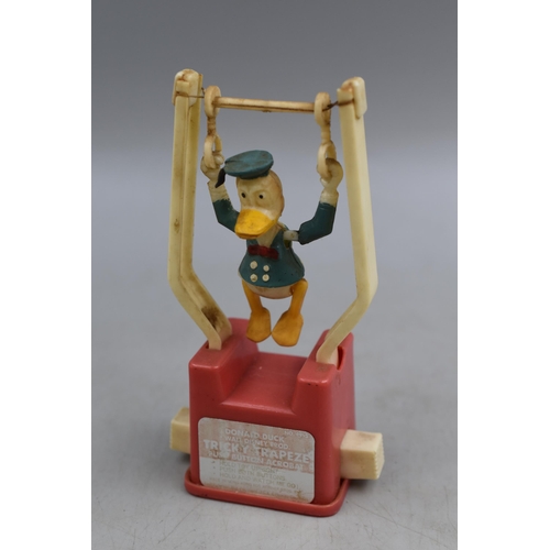 160 - A Retro Disney Donald Duck Tricky Trapeze Toy, Approx 5” Tall. In Working Order