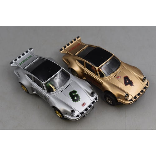 175 - Two Scalextric with Lights Porsche Racing Cars complete with Boxes