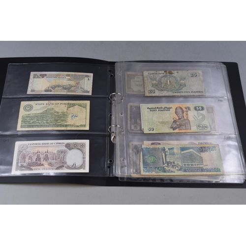 273 - Folder Containing a Selection of Old Worldwide Banknotes. Includes Pakistan, Cyprus, Saudi Arabia, E... 