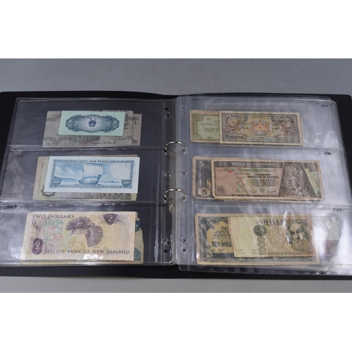 273 - Folder Containing a Selection of Old Worldwide Banknotes. Includes Pakistan, Cyprus, Saudi Arabia, E... 