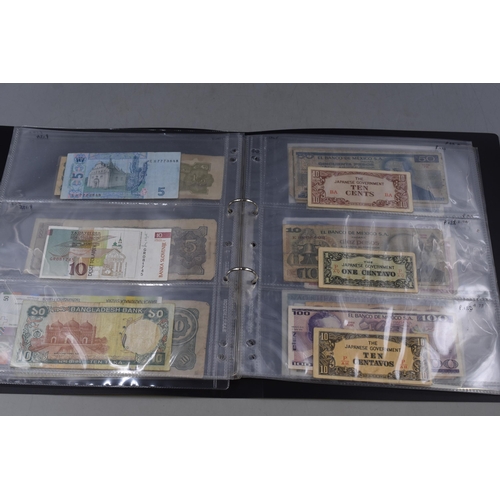 273 - Folder Containing a Selection of Old Worldwide Banknotes. Includes Pakistan, Cyprus, Saudi Arabia, E... 