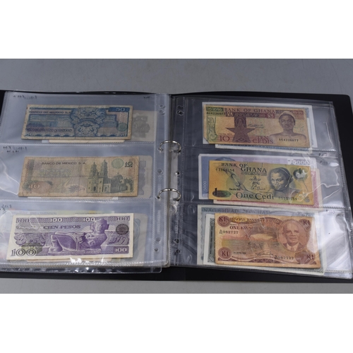 273 - Folder Containing a Selection of Old Worldwide Banknotes. Includes Pakistan, Cyprus, Saudi Arabia, E... 