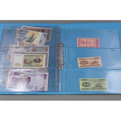 276 - Folder Containing a Large Selection of Uncirculated Worldwide Banknotes. Includes Allied British Arm... 