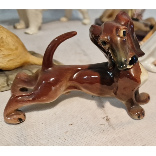 302 - Dog Themed Ornaments Includes Hummell, 1959 Capodimonte, Wade, Border Fine Arts and more.