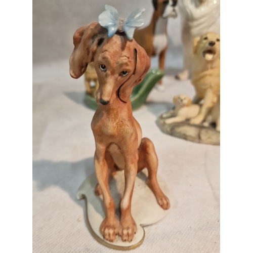 302 - Dog Themed Ornaments Includes Hummell, 1959 Capodimonte, Wade, Border Fine Arts and more.