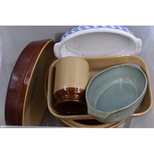 637 - Large selection of Kitchen stoneware items to include lidded casserole, serving dishes, and more