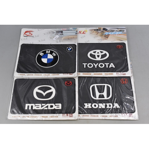 702 - Sixteen New Dashboard Anti Slip Mats (Toyota, BMW & Toyota)