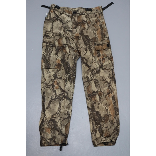 772 - Mixed selection of Outdoor items Including Stormkloth Camo Thermal Trousers, Arco Tectiv Trousers, V... 