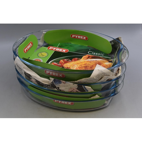 726 - Four Brand New Pyrex Cooking Dishes