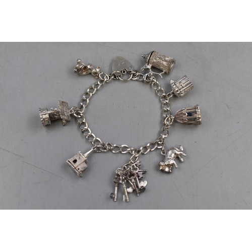 39 - Silver 925 Charm Bracelet with 9 Charms