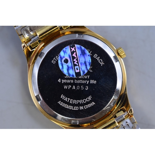 74 - A Gold Tone Omax Crystal Waterproof Quartz Watch, Working