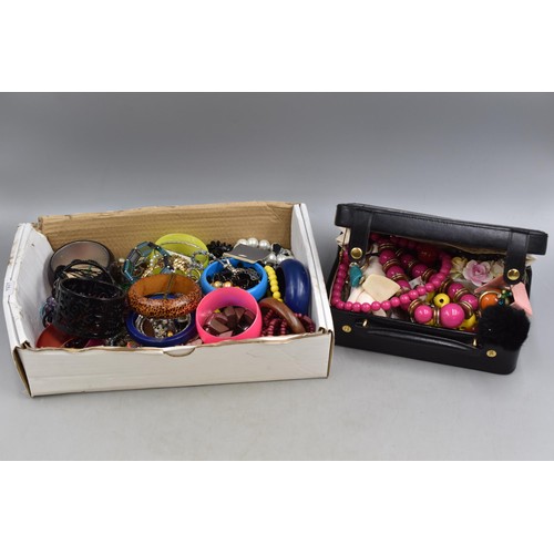 438 - A Large Selection of Costume Jewellery, In Two Boxes