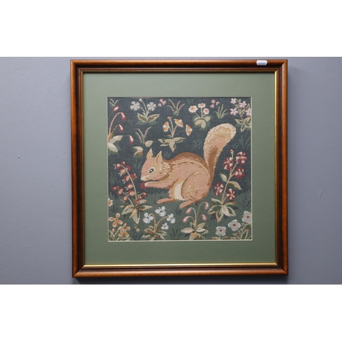 645 - Squirrel tapestry picture in wood frame measures 20