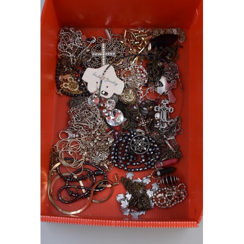 397 - Selection of metallic necklaces with crosses, hearts and others