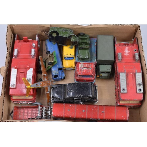 489 - A Selection of Thirteen Playworn Diecast Dinky Vehicles and Accessories