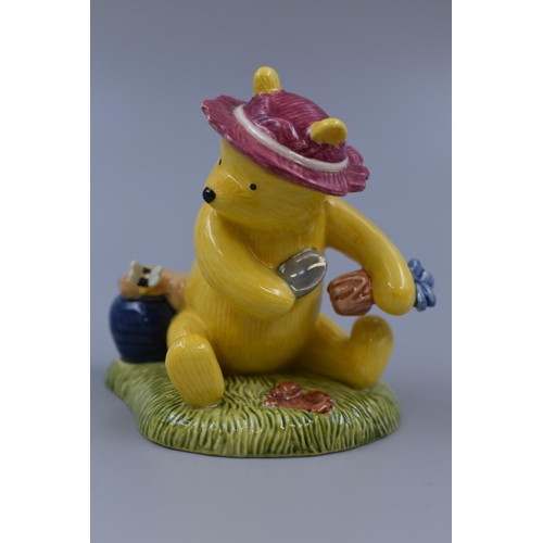 176 - A Boxed Royal Doulton Winnie The Pooh 'The Perfect Hat For Gardening' Figurine, Approx 3.5