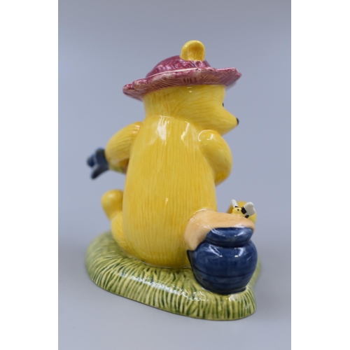 176 - A Boxed Royal Doulton Winnie The Pooh 'The Perfect Hat For Gardening' Figurine, Approx 3.5