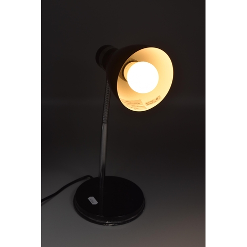 182 - Three lamps one flexible desk lamp in black, one onyx with green shade and one white ceramic, all wo... 