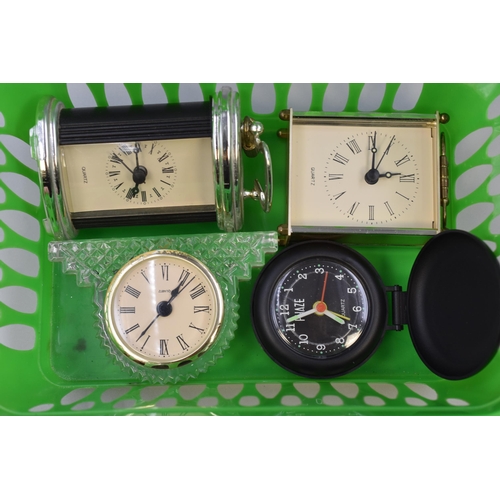 197 - Four small clocks, 2 carriage clocks largest 5