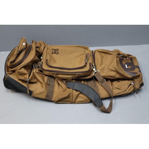 535 - A Large DC Shoes Pull Along Holdall, In Brown. AF