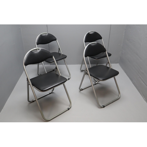 536 - Set Of Four Pre-Owned Steel Fold Away Chairs Padded Seat and Back Rest