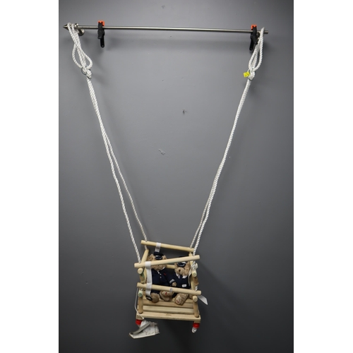 539 - A Wood and Rope Children's Swing Seat, With Two Pilot Teddy Bears