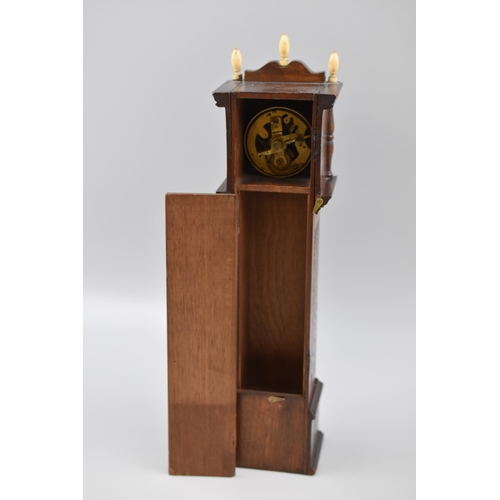 249 - Small Ornamental Wind Up Grandfather Clock Decoration with Bone finish and a Handcarved Design, work... 