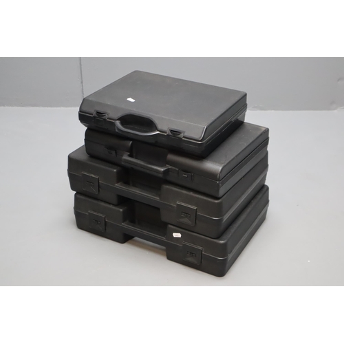 Four Black Plastic Protective Cases With Foam Inserts. Largest Approx