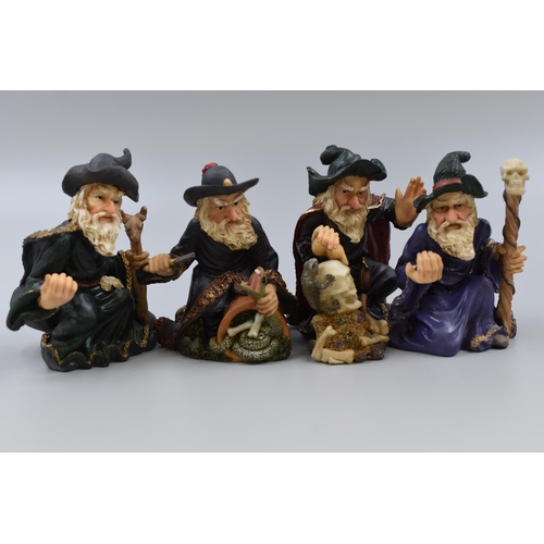 145 - Collection of Four Mystical Wizard Statues