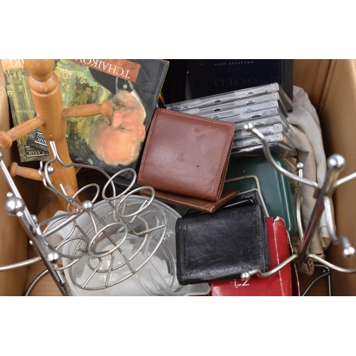 857 - Mixed lot of household items to include 3 leather wallets, mug trees, cash box, hole punch selection... 