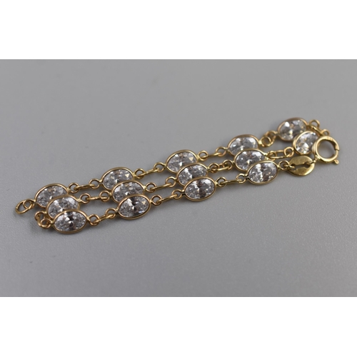 7 - Hallmarked Gold 375 (9ct) Clear Stoned Bracelet. Complete in Presentation Box (3.53 grams)