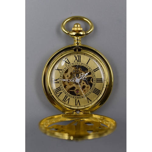 137 - Treeveto pocket watch with fob, features opening front with dragon motif and transparent rear case d... 