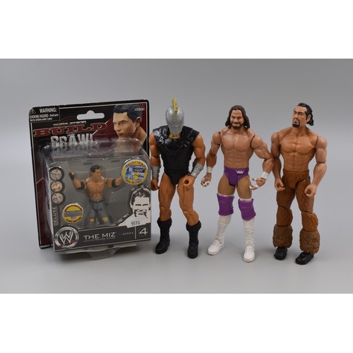 633 - Four items to include Boxed WWE Deluxe The Miz Figure Build and Brawl, Together with Three Individua... 