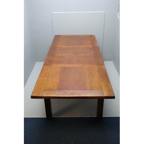 642 - Dark hardwood extending dining table with six chairs, measures 60