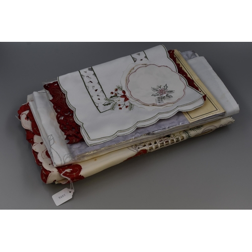 648 - Selection of Christmas themed Linen including Table Cloths and Runners