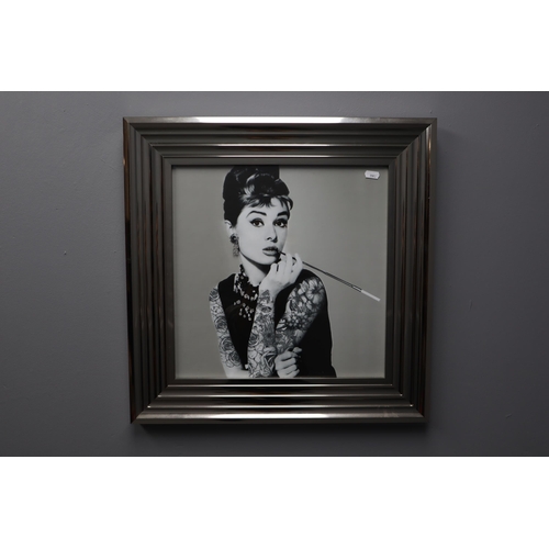 440 - A Framed and Glazed Biggon Audrey Hepburn With Tattoos and Diamantes Print, Approx 21.5